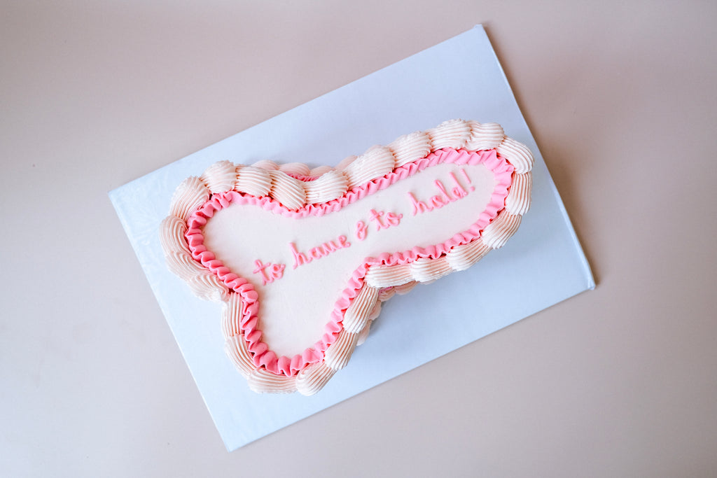 An ornate penis shaped bacholorette cake