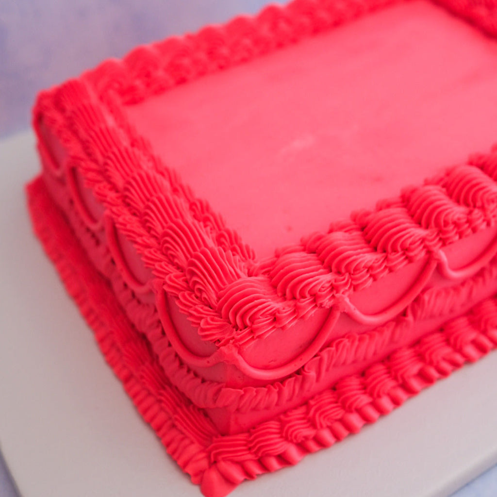 hot pink ornate sheet cake 