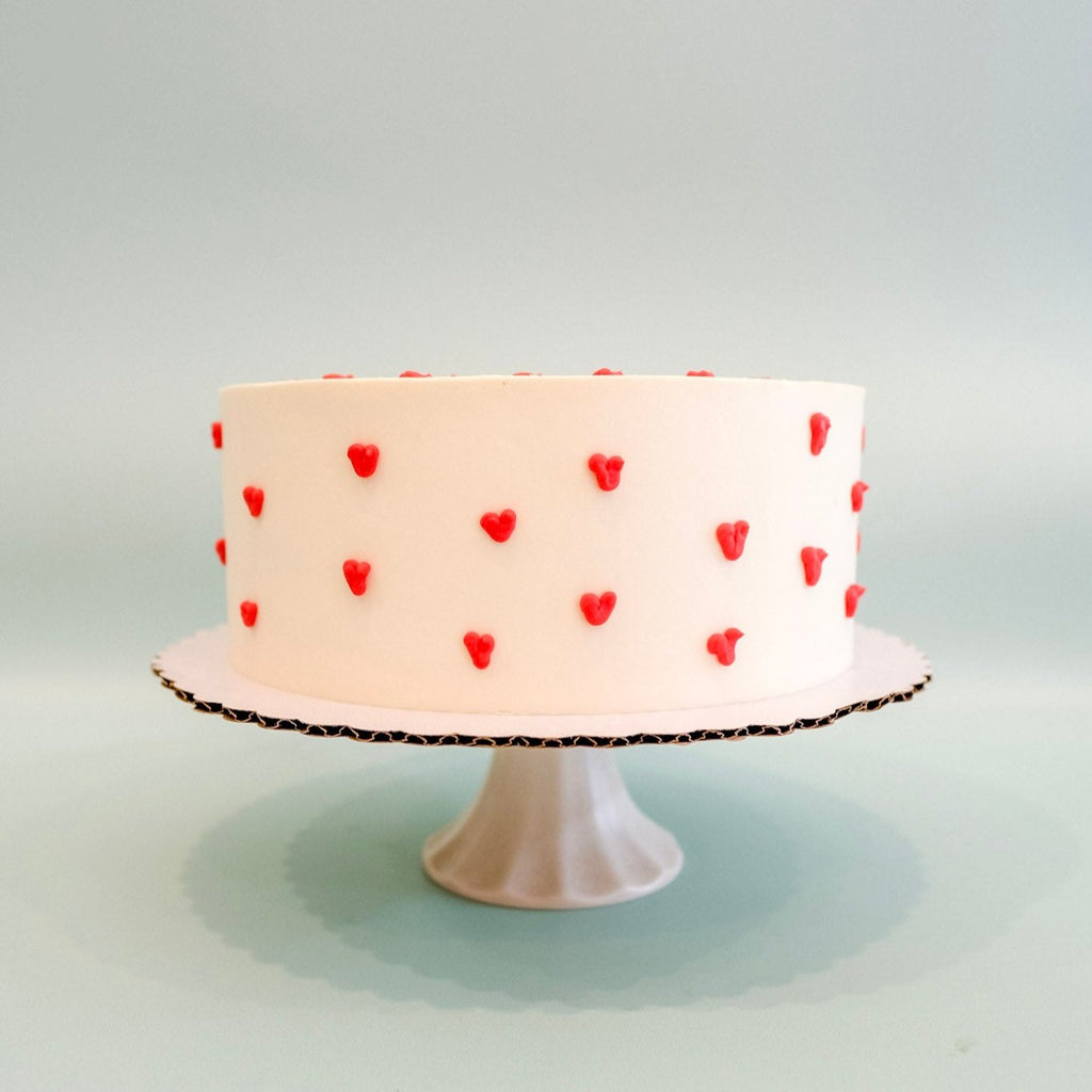 Round cake with tiny hearts