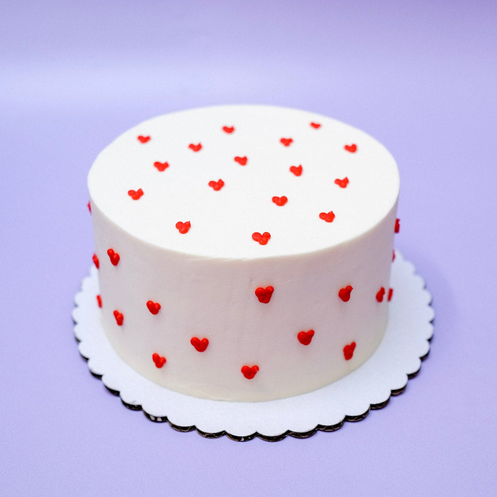 Round cake with tiny hearts
