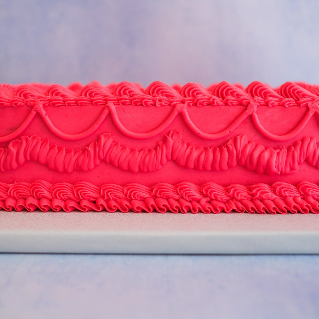 hot pink ornate sheet cake 