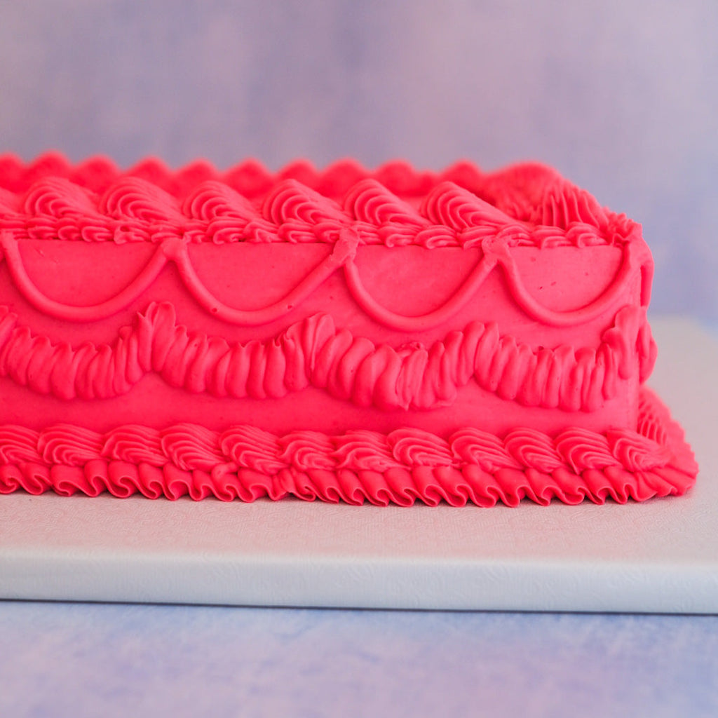 hot pink ornate sheet cake 