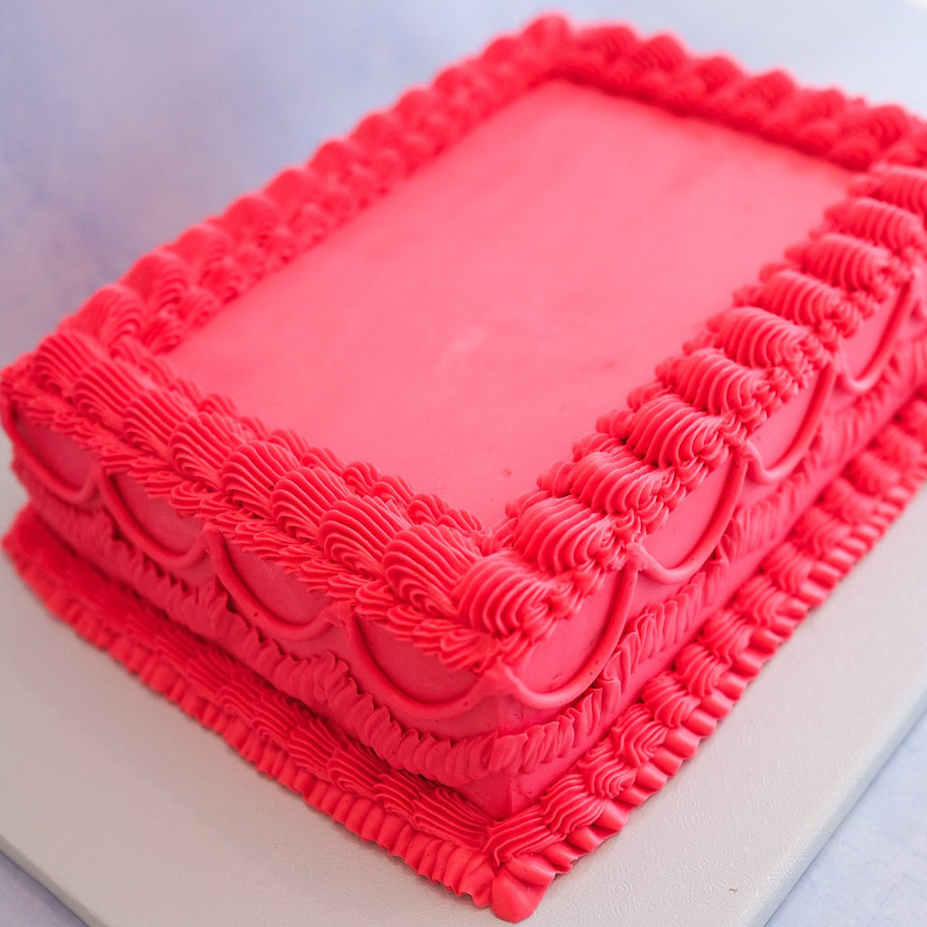 hot pink ornate sheet cake 