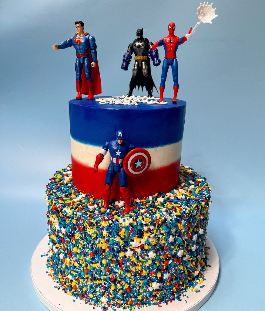A superhero two tiered cake