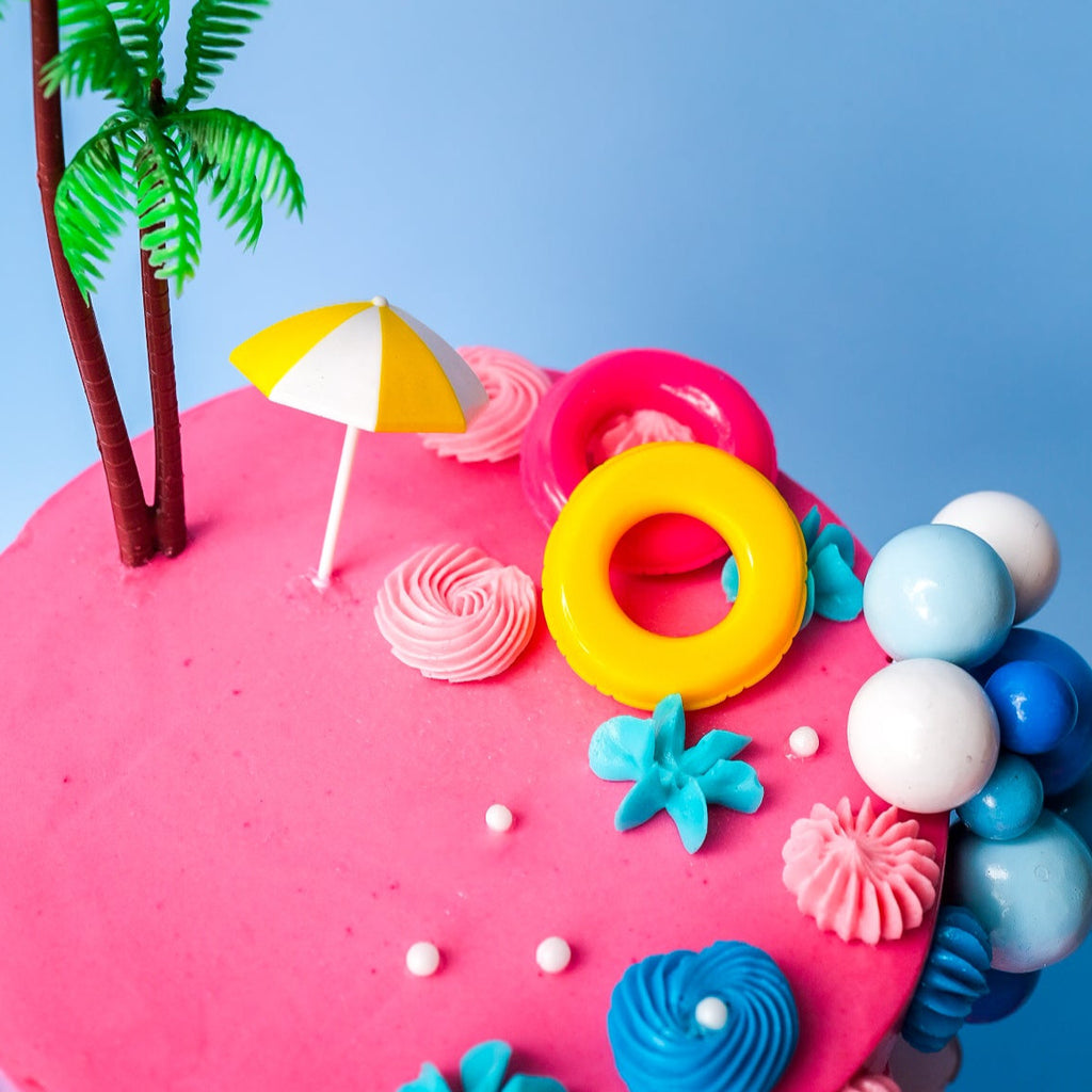 A Pink Malibu Barbie Themed Cake 