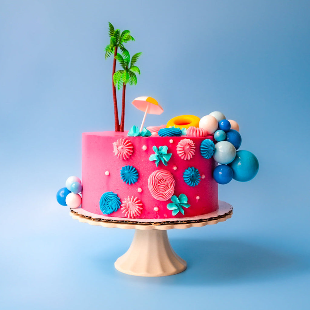 A Pink Malibu Barbie Themed Cake 