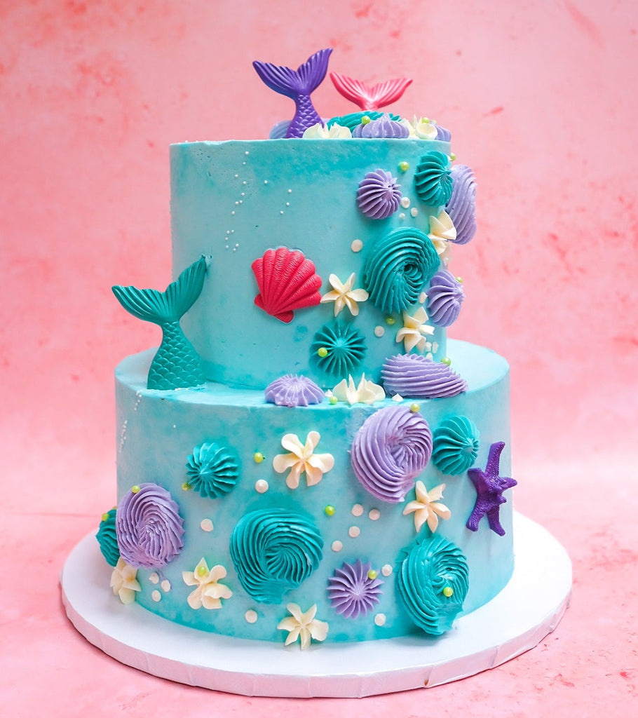 A two tiered mermaid cake