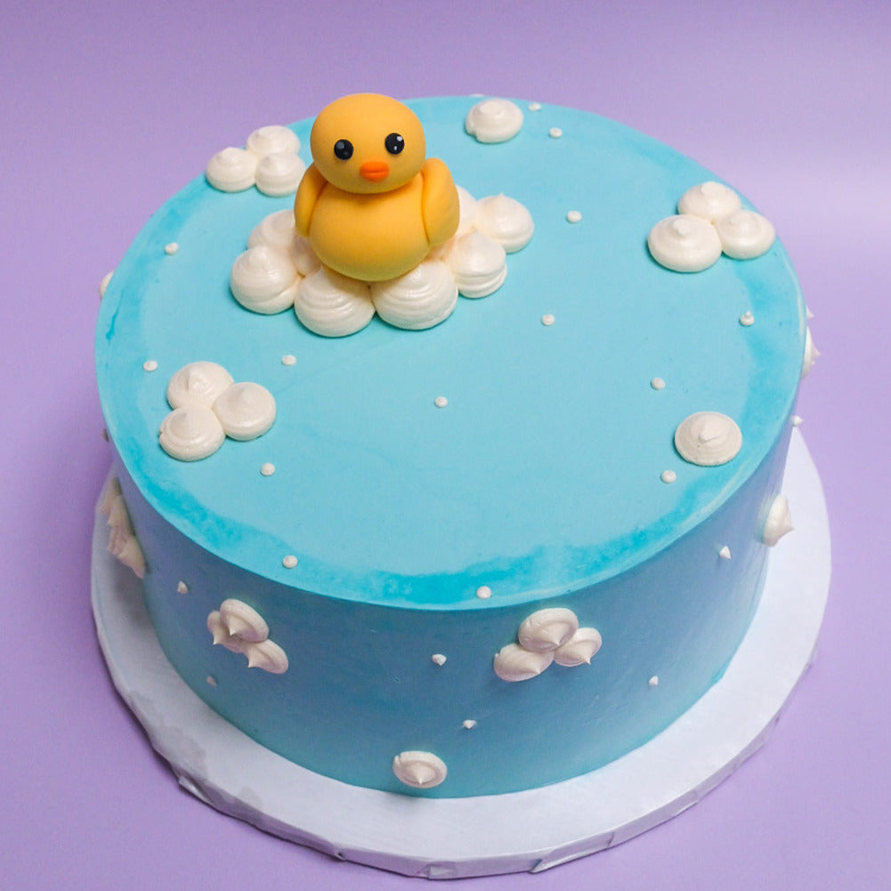 A blue rubber duck cake 