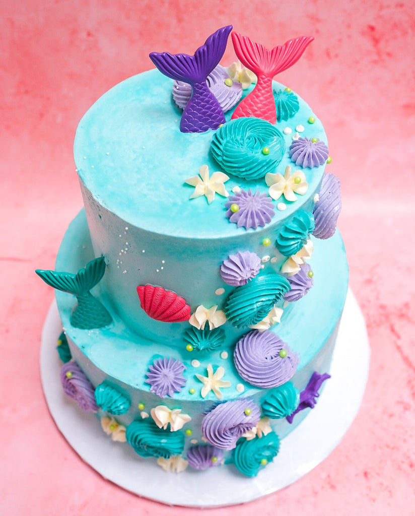 A two tiered mermaid cake