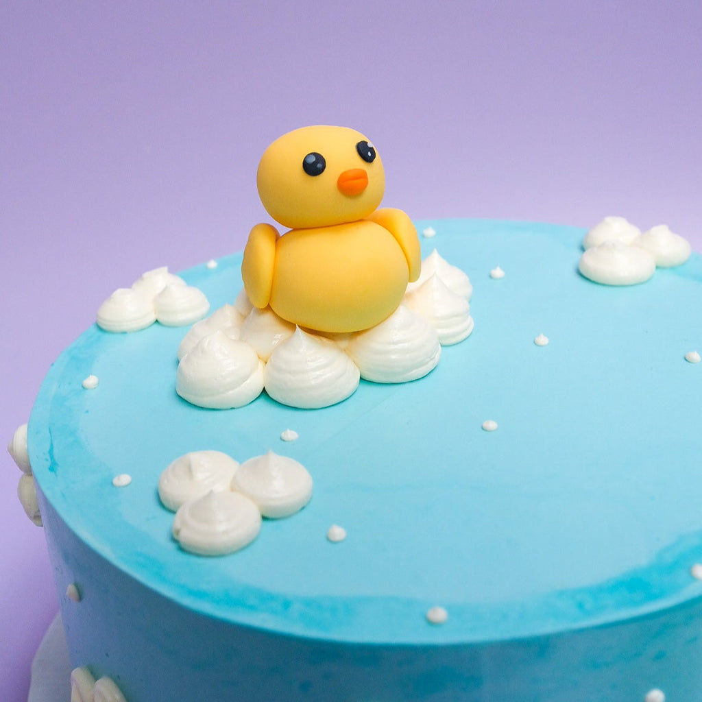 A blue rubber duck cake 