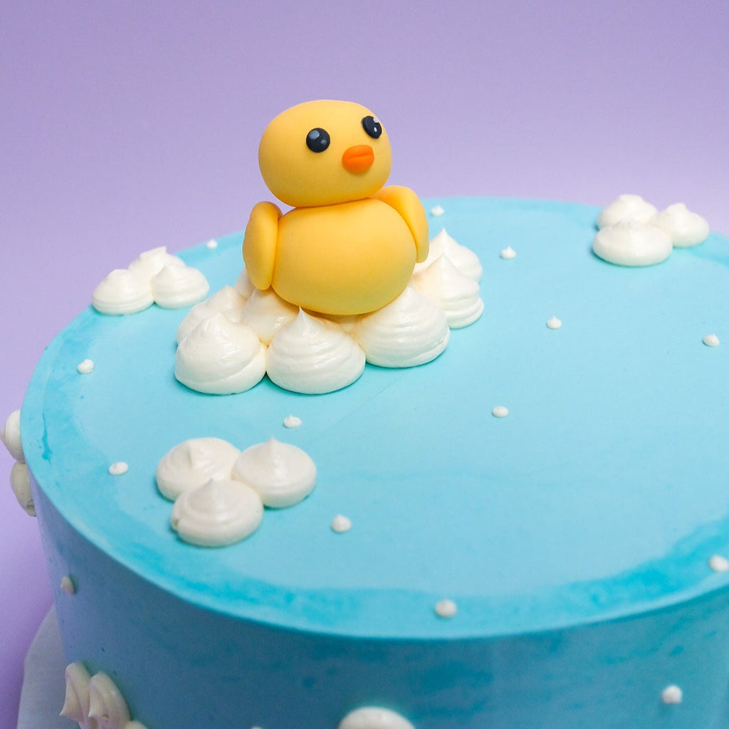 A blue rubber duck cake 