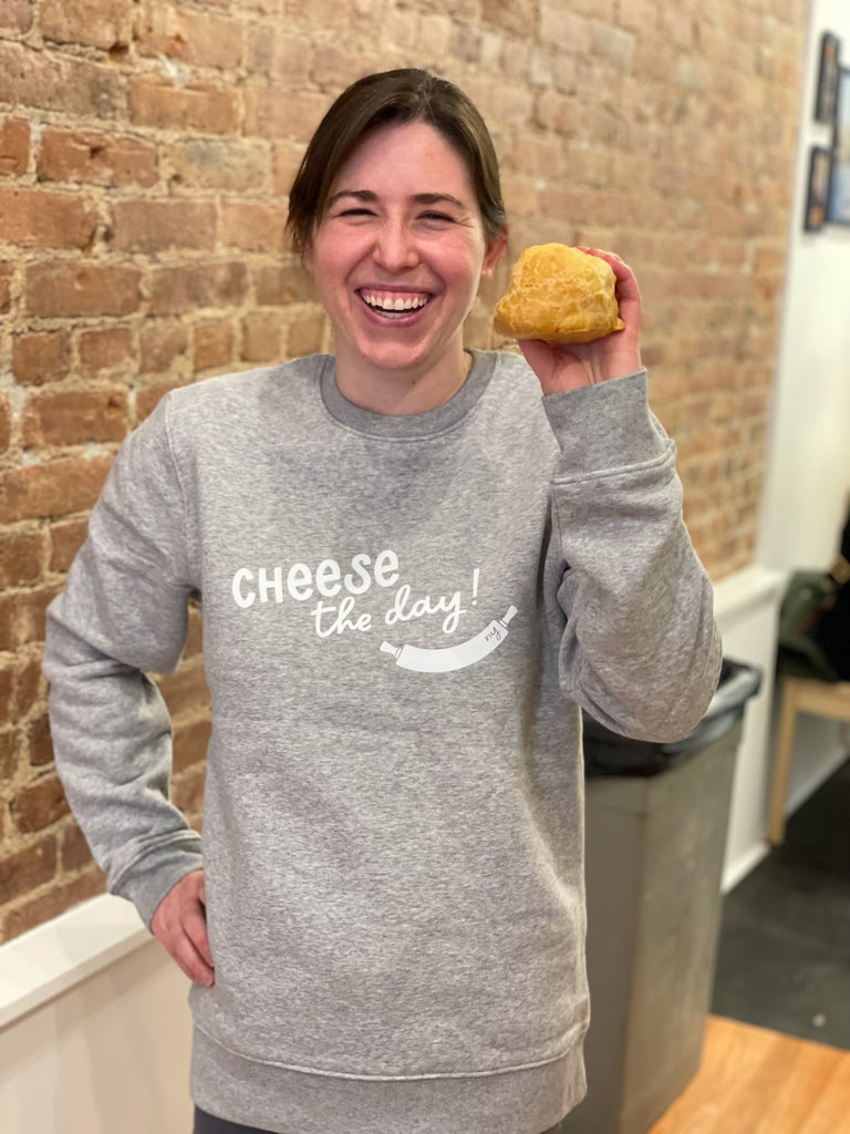 Megan wearing a Padoca cheese the day sweater